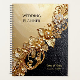 Planner met gouden bloemversieringen