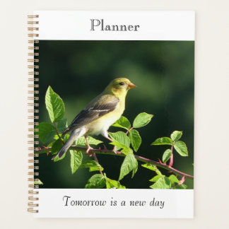 Planner met op zittende vogel