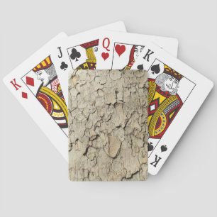 Plantenboomcamouflage ziet er uit op een schuurpat pokerkaarten