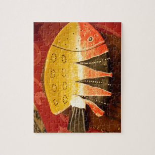 platte gele en rode vis met zwarte strepen.jpg legpuzzel