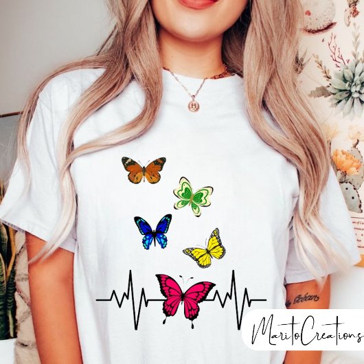 Playera fiesta de mariposa para damas. t-shirt