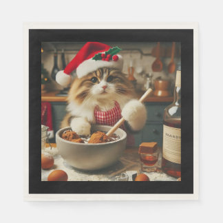 Pluizige kat bakt drankrijke kerstpudding servet