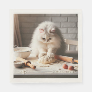 Pluizige kat bakt een pizzabodem servet