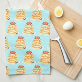 Pluizige pannenkoeken met ahornsiroop, fruit en ro theedoek