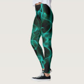 Plumes van groene rook op zwart leggings (Links)