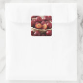 Plums in mand vierkante sticker (Tas)