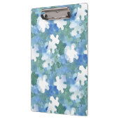 Pocket-map van geschilderd blauw en groen puzzelst klembord (Links)
