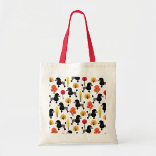 Poedel in het park tote bag