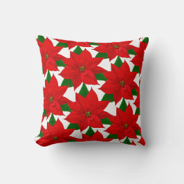 Poinsettia bloemen op wit kussen