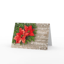 Poinsettia, dennenhout met kerstmoeder in de wet