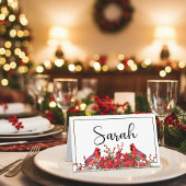 Poinsettia en holly met kardinalen kerst plaatskaartje