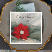 Poinsettia en parels over het groene winterhuwelij servet