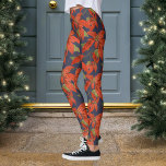 Poinsettia kerst leggings<br><div class="desc">Poinsettia patroon met aangepaste achtergrondkleur. Ze zouden geweldig zijn om je lelijke trui-ensemble toe te voegen. Maak het uiterlijk compleet met een paar kerst - boomoorringen :)</div>