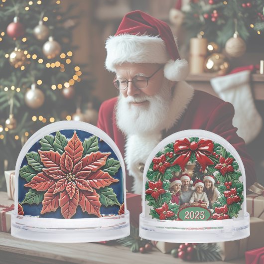 Poinsettia op blauwe kerst sneeuwbol