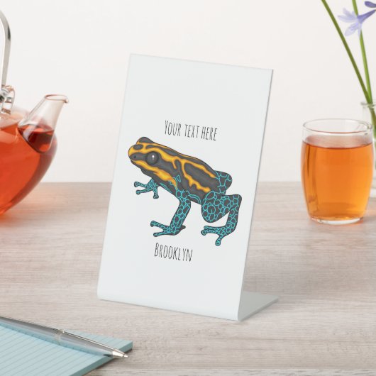 Poison dart frog cartoon illustratie reclamebord met voetstuk (Insitu)