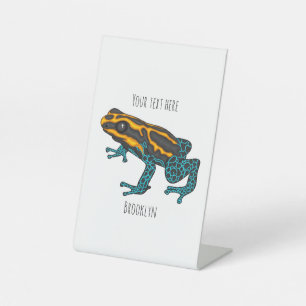 Poison dart frog cartoon illustratie reclamebord met voetstuk