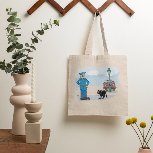 Politieagent en zwarte kat tote bag
