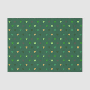 Polka harten op bosgroen tissuepapier