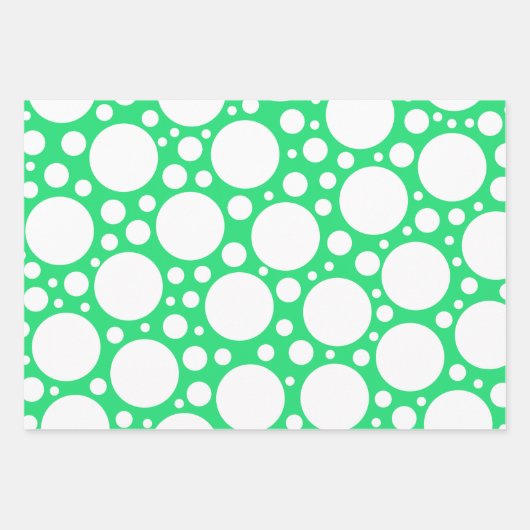 Polka-punten in drie kleuren die papierbladen over inpakpapier vel (Voorkant 2)