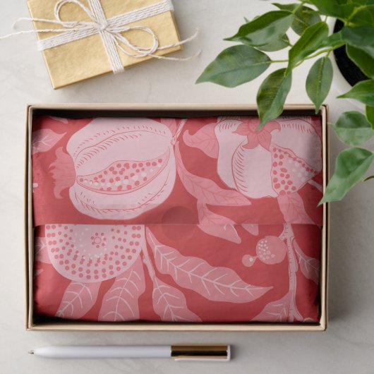 Pomegranaat in kerstrood tissuepapier (Geschenk)