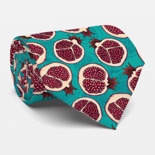 Pomegranaatplakken op turquoise stropdas