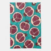 Pomegranaatplakken op turquoise theedoek (Verticaal)