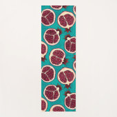 Pomegranaatplakken op turquoise yogamat (Voorkant)