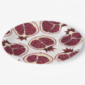 Pomegranaatplakken op wit papieren bordje (Gekanteld)