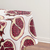 Pomegranaatplakken op wit tafelkleed (Voorbeeld)