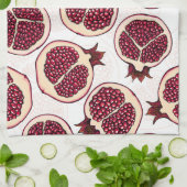Pomegranaatplakken op wit theedoek (Gevouwen)