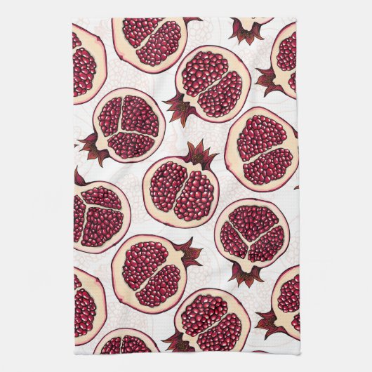 Pomegranaatplakken op wit theedoek (Verticaal)