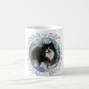 Pomeraan in bloementuin koffiemok