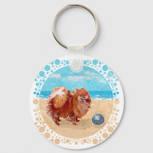 Pomeranian aan de kust sleutelhanger