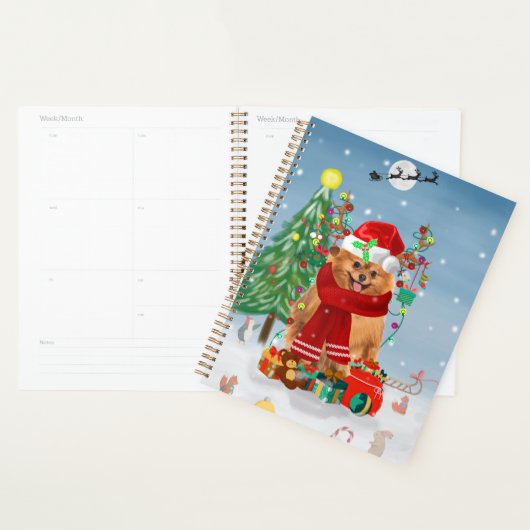 Pomeranian hond met kerstcadeaus   planner (Display)