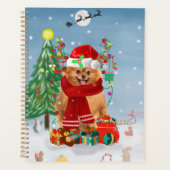 Pomeranian hond met kerstcadeaus   planner (Voorkant)