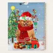 Pomeranian hond met kerstcadeaus   planner (Achterkant)