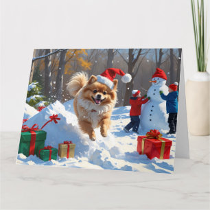 Pomeranian Rent in de Sneeuw met Kerstmuts Kaart
