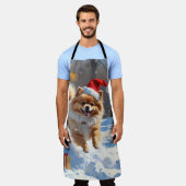 Pomeranian Rent in de Sneeuw met Kerstmuts Schort (Gedragen)