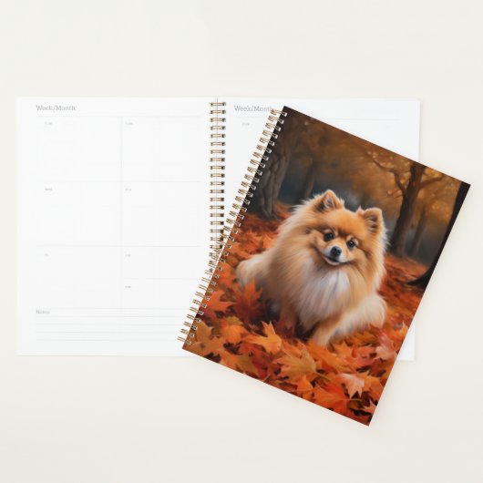 Pomeranian tussen vallende herfstbladeren inspiree planner (Display)
