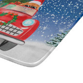 Pommeren die met sneeuwkerst rijden snijplank (Hoek)