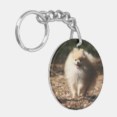 Pommeren draaien in de Gestorven bladeren Sleutelhanger (Voorkant Links)