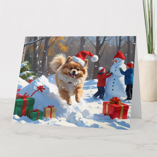 Pommerse hardlopen in de sneeuw met kerst Pet Kaart (Voorkant)