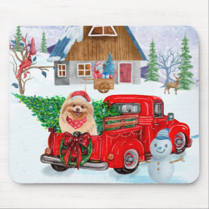 Pommerse hond in kerstcadeauwagen muismat