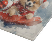 Pommerse Hond in Sledge Laat het Sneeuw Kerstmis Snijplank (Hoek)