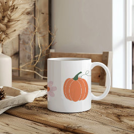 Pompoen en bloemen in de herfst koffiemok