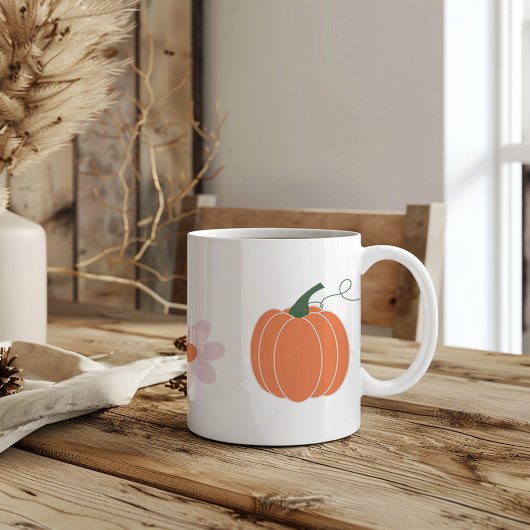 Pompoen en bloemen in de herfst koffiemok