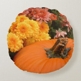 Pompoen met geel en koraal mama's rond kussen