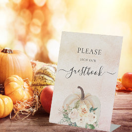 Pompoenbloemen vallen onder het gastenboek reclamebord met voetstuk