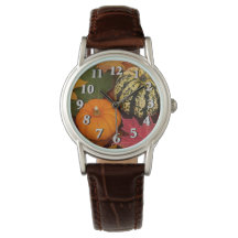 Pompoenen en bladeren