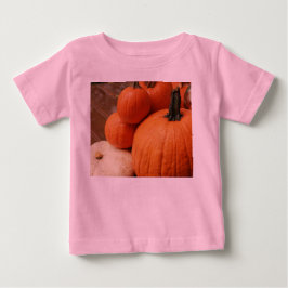 pompoenen voor Halloween op het dek